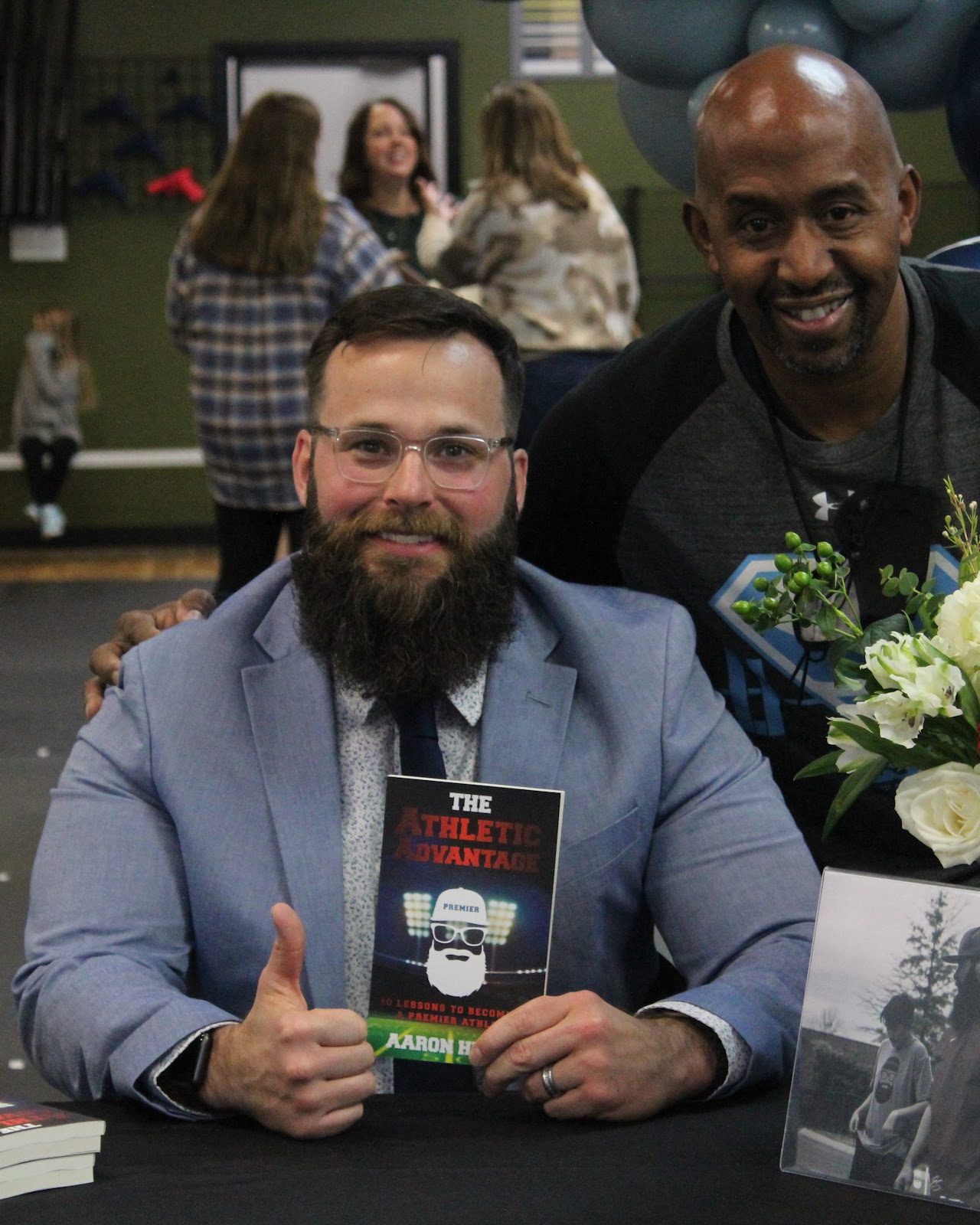 Coach Aaron Hines at a signing for his book